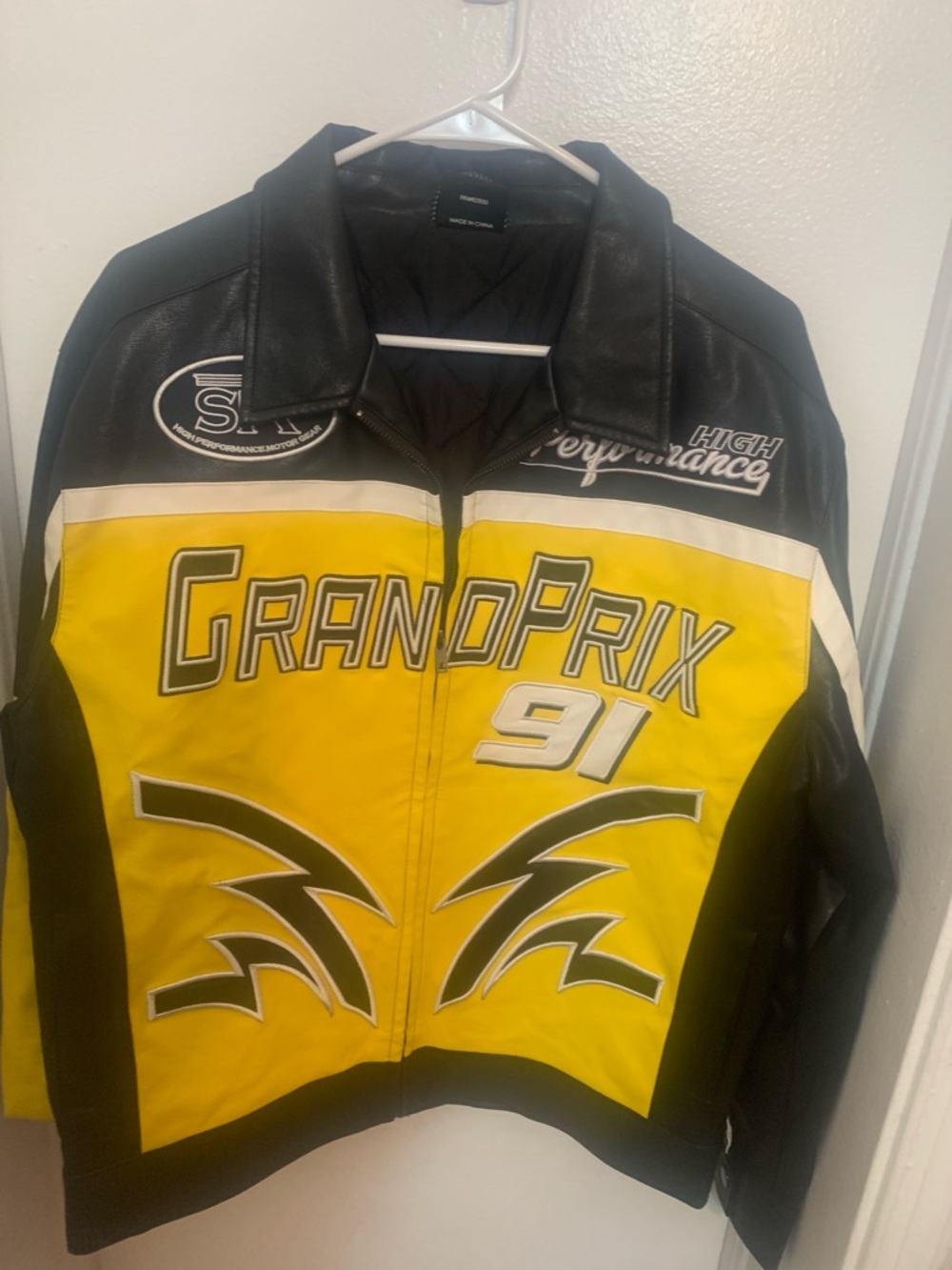 Yellow and Black Racing-Style Jacket with Graphic Detail